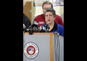 U.S. Secretary of Homeland Security Janet Napolitano speaks during a press conference May 22, 2013 in Moore, Oklahoma. The two-mile-wide Category 5 tornado touched down May 20 killing at least 24 people and leaving behind extensive damage to homes and businesses. U.S. President Barack Obama promised federal aid to supplement state and local recovery efforts.   / Photo by Brett Deering/Getty Images