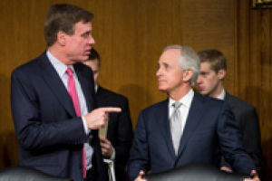 Senators Mark Warner, left, and Bob Corker are working on a bill to address problems with the mortgage giants Fannie Mae and Freddie Mac. / Bill Clark:CQ Roll Call, via Getty Images