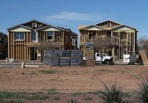 New homes under construction at a housing development in Gilbert, Ariz., in March. / Getty