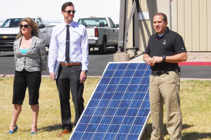 Harmon Solar CEO Julie King and Max Burger, SRP commercial solar incentive program administrator, listen to Sean Desmond, director of sales and marketing for Bonded Logic. project./  Provided by Bonded Logic
