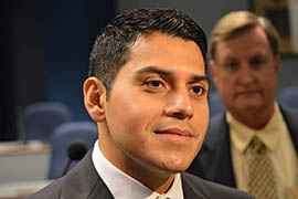 Rep. Steve Montenegro, R-Avondale, talks with reporters Thursday after the House Government and Higher Education Committee approved his bill to require Arizona high school students to pass the same civics test given to new citizens.