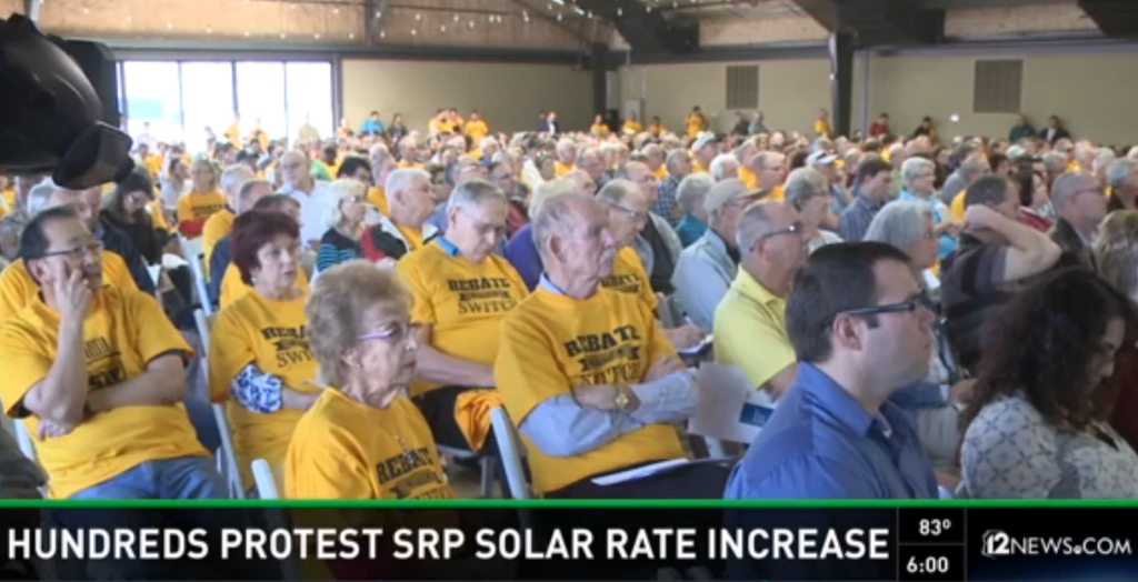 An overflow crowd of 500 people poured into an SRP meeting hall Monday morning on Tempe, the overwhelming majority of them protesting the utility's plan to jack up costs for solar customers.