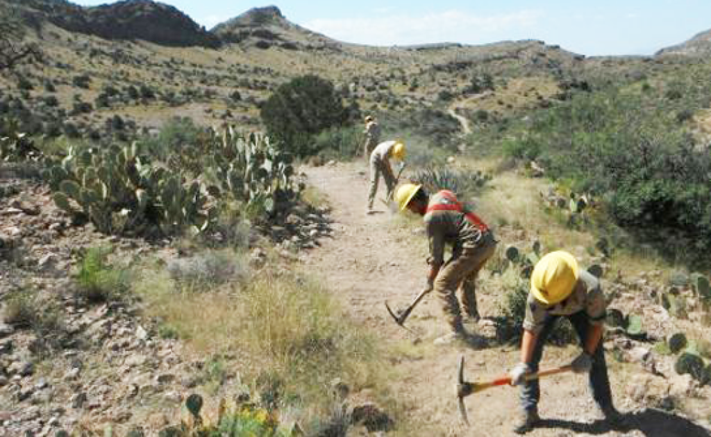 Trail Restoration Project. Portions of revenue from renewable energy development can be reinvested into local communities to help offset some of the impacts on wildlife and their habitat./ Southwest Conservation Corps 