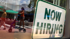 MIAMI BEACH, FL - JULY 05:  A ''Now Hiring'' sign is seen in the store front window on July 5, 2012 in Miami Beach, Florida. The ADP released the National Employment Report which showed that employment in the U.S. nonfarm private business sector increased by 176,000 from May to June on a seasonally adjusted basis.The government will release its closely watched employment report for June on Friday. (Photo by Joe Raedle/Getty Images)