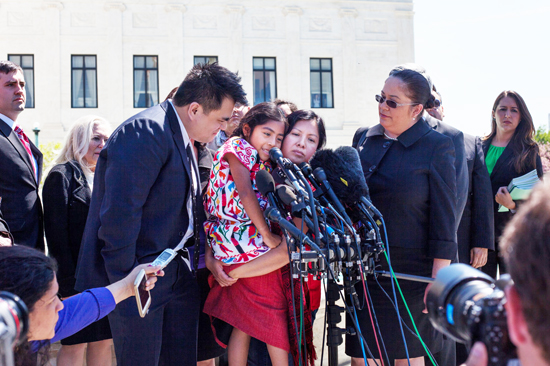 Immigrant activists, including Jose Antonio Vargas and Sophie Cruz, speak to reporters after oral arguments at the Supreme Court. /Kara Frame:NPR