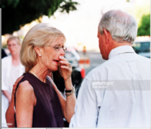 Susan Goldwater (L), the widow of former US Senator Barry Goldwater (R-AZ), leaves the church with Robert Goldwater (R), the brother of the Senator following an all-day public viewing of the casket 02 June, 1998 in Tempe, AZ. 