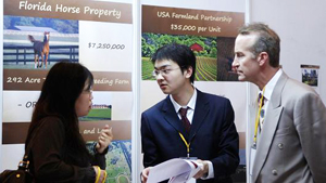 Chinese investors negotiate at the US-China Real Estate summit & trade fair in Beijing. :File photo:Zhang Peng | LightRocket | Getty Images