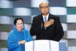 Khizr Khan, father of fallen Army Capt. Humayun Khan, holds up a copy of the Constitution during the Democratic National Convention. /SAUL LOEB:AFP:GETTY IMAGES