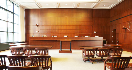 Modern governmental hearing room in a large North American City.