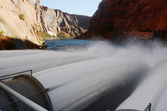 Glen Canyon Dam High Flow Experiment/Water rushes out of bypass tubes in Glen Canyon Dam during the Bureau of Reclamation's 2013 high flow experiment. / Courtesy Bureau of Reclamation