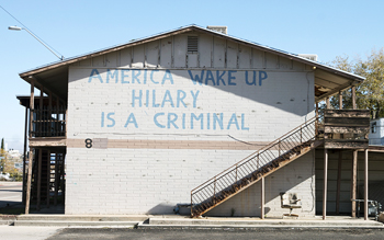 An apartment building in Miami, Arizona has an anti-Hillary Clinton message scrawled on it. Although Globe-Miami residents said the area has traditionally been liberal, some are hoping to see an increase in bipartisan politics under a Donald Trump presidency. /Photo by Joshua Bowling/Cronkite News