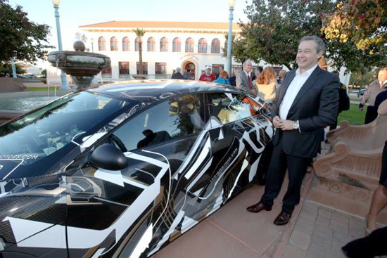 Peter Rawlinson, chief technology officer of Lucid Motors, stands beside a prototype of the electric car the company plans to build in a $700 million assembly plant to be built in Casa Grande./Oscar Perez/PinalCentral