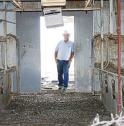 David Kerr, who sold his dairy farm more than a decade ago, still has vestiges of the operation behind his Buckeye home. /Photo by Kristiana Faddoul/Cronkite News