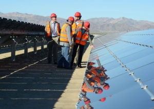 U.S. Interior Secretary Sally Jewell and other federal officials inspecting solar panels at the Desert Sunlight Solar Farm on federal lands in California in 2015. /Credit: U.S. Dept. of Interior/flickr