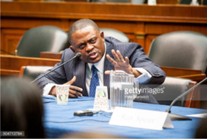Forensic pathologist and neuropathologist Dr. Bennet Omalu participates in a briefing sponsored by Rep. Jackie Speier (D-CA) on Capitol Hill on January 12, 2016 in Washington, DC. Dr.Omalu is credited with discovering chronic traumatic encephalopathy, or CTE, in former NFL players. /Photo by Pete Marovich/Getty Images