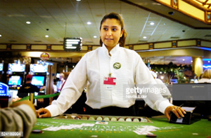  Blackjack dealer at Cliff Castle Casino. The casino is owned by the Yavapai-Apache Nation and has contributed to the economic growth of the Verde Valley by creating new jobs within the Native American community. /Photo by Neville Elder/Corbis via Getty Images 